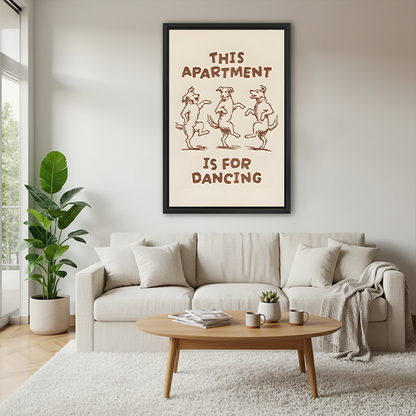 Woman holding framed dancing dogs apartment canvas wall art with playful vintage lettering in a bright room