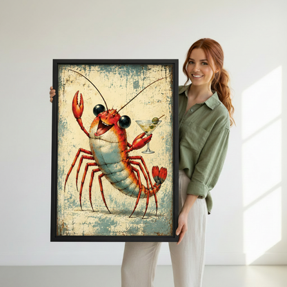 Woman holding framed lobster cocktail canvas wall art to show its scale and detailed vintage illustration.